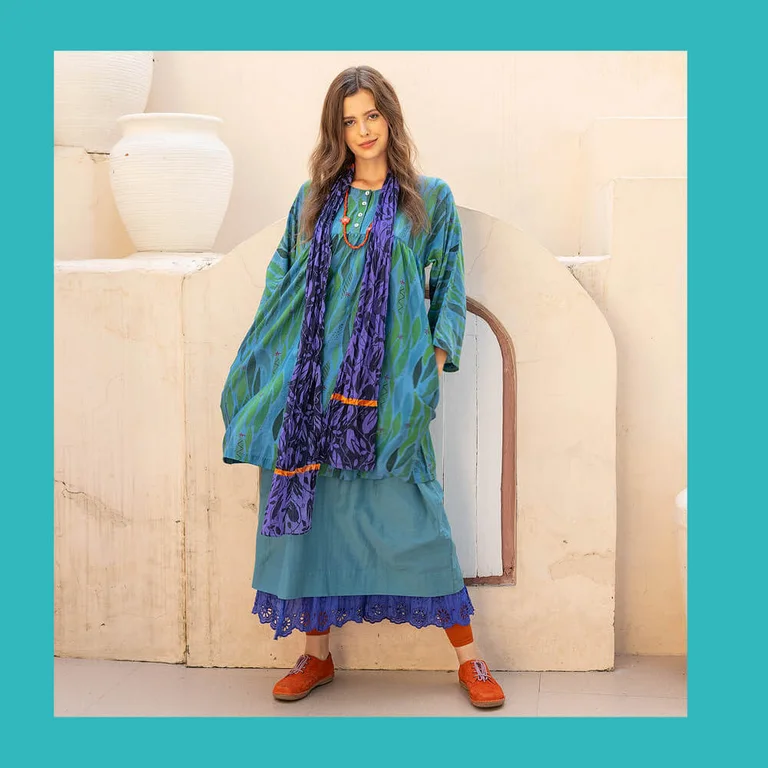 A woman wearing layers of clothes from Gudrun Sjödén’s Paris collection. 