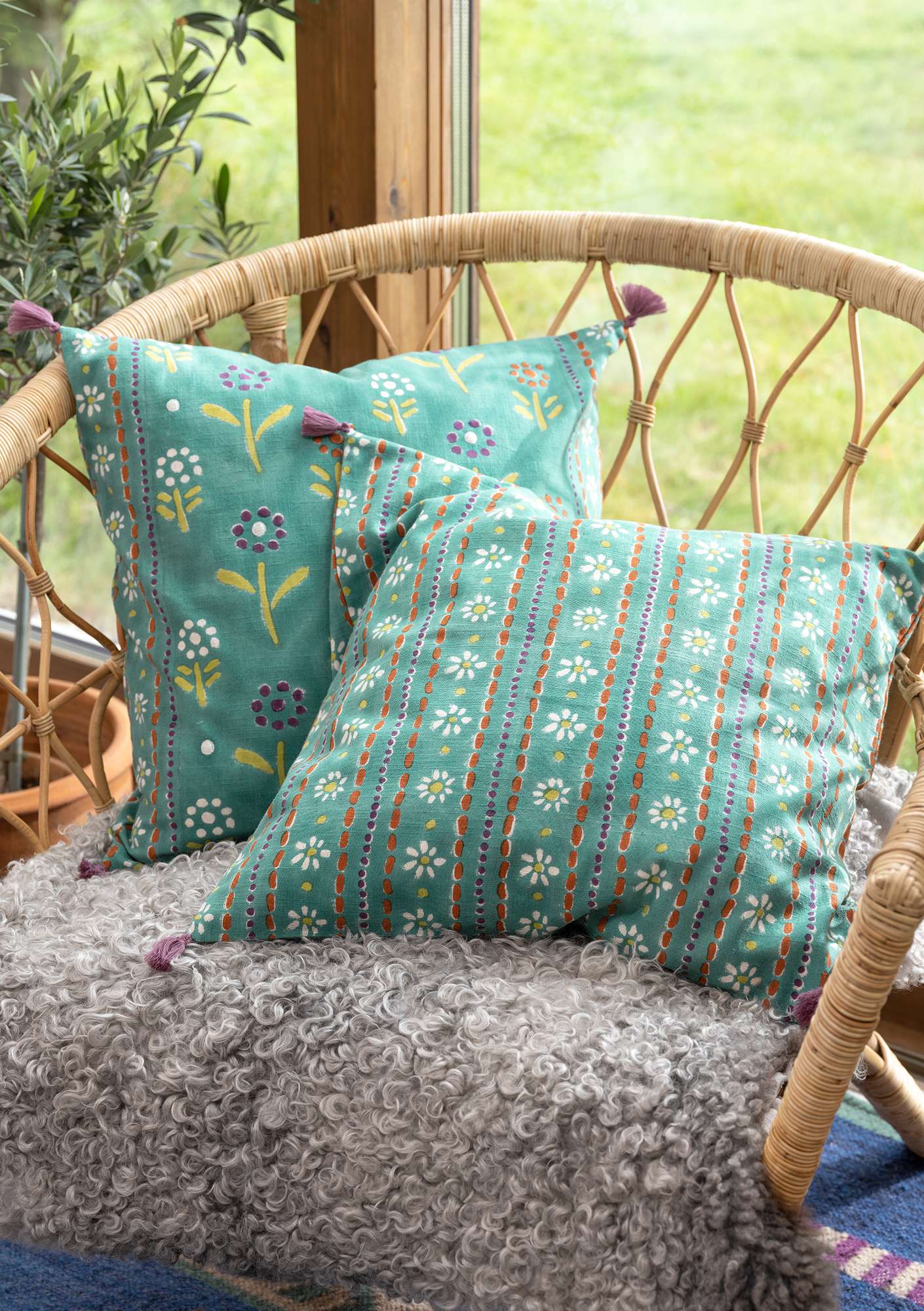 “Chai” cushion cover in organic cotton meadow brook