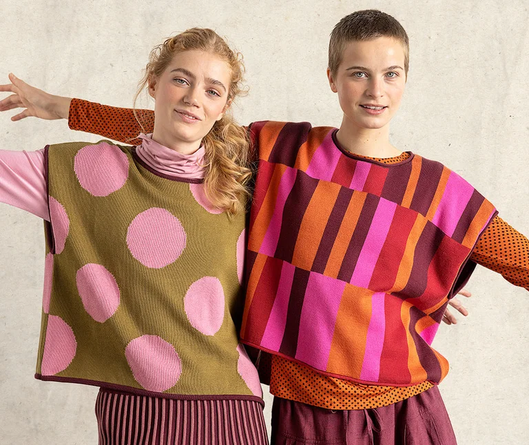 Two women wearing patterned sleeveless tops from Gudrun Sjödén.