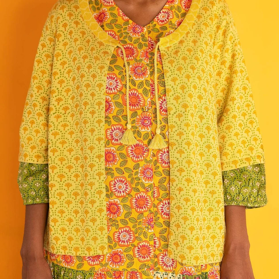 Strikcardigan "Haldi" i økologisk bomuld - mango