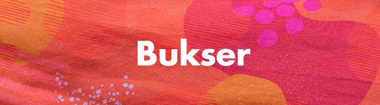 Et blomstret mønster med teksten "Bukser" i hvid.
