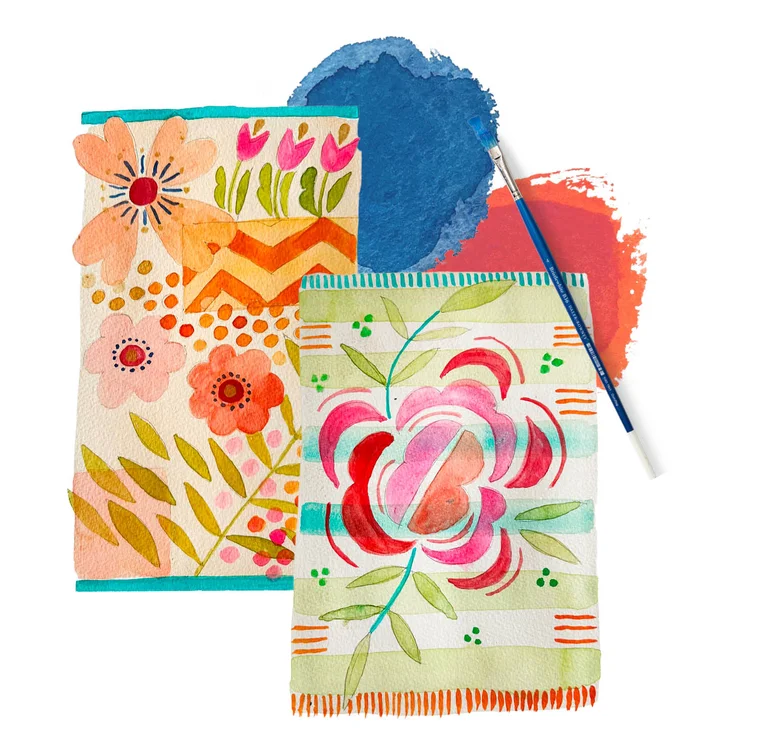 Two watercolour sketches of floral rugs by Gudrun Sjödén, next to a paintbrush and daubs of blue and red paint.