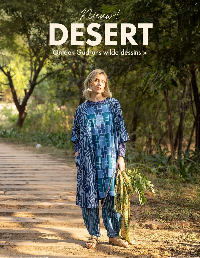 Three women standing next to each other outdoors wearing patterned clothes from Gudrun Sjödén.