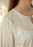 “Amisha” embroidered dress in a woven blend of organic cotton and linen (feather M)