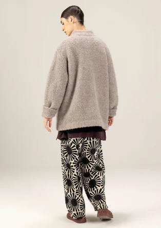 Strikket jakke i ullbouclé - lys potet/meleret