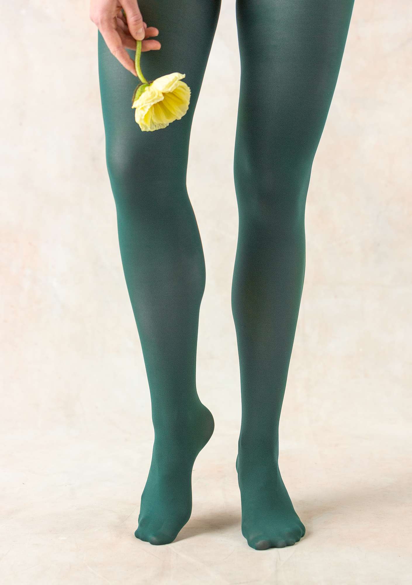 Solid-colour tights made from recycled polyamide bottle green