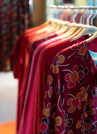Red and pink clothes from Gudrun Sjödén.