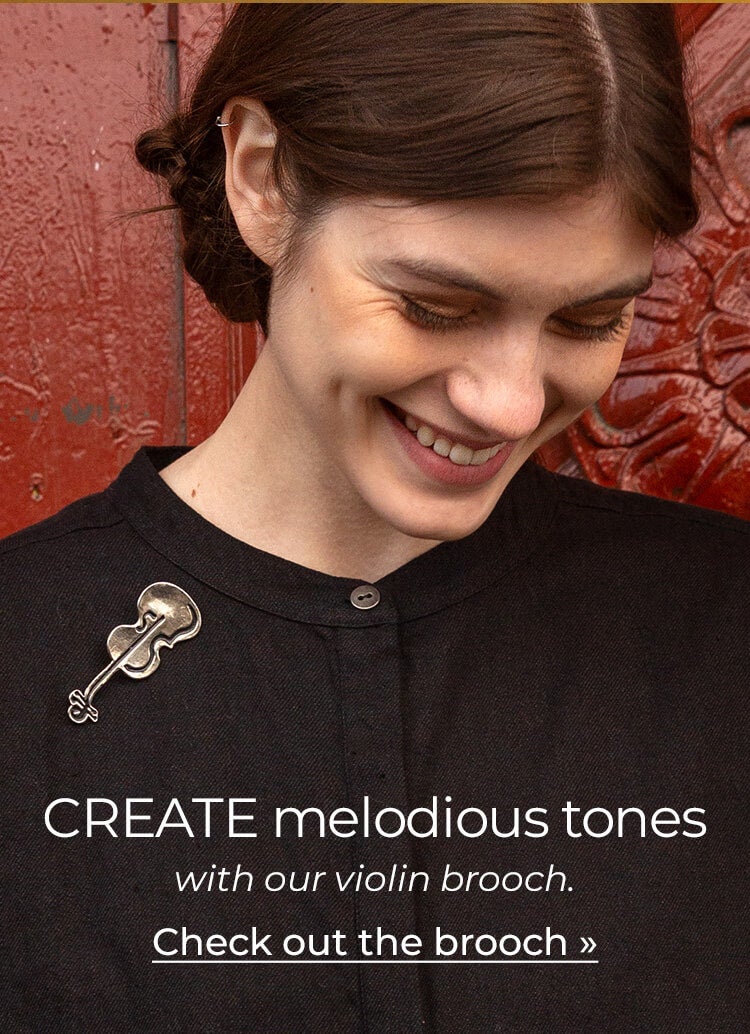 Create melodious tones with our violin brooch