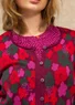 Florale Strickjacke „Hillevi“ aus Bio-/Recycling-Baumwolle (aubergine XL)