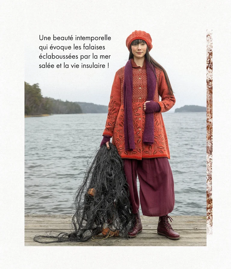 A woman wearing an orange knit cardigan and beret from Gudrun Sjödén.  