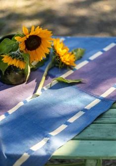 “Ira” organic cotton table runner - brilliant blue