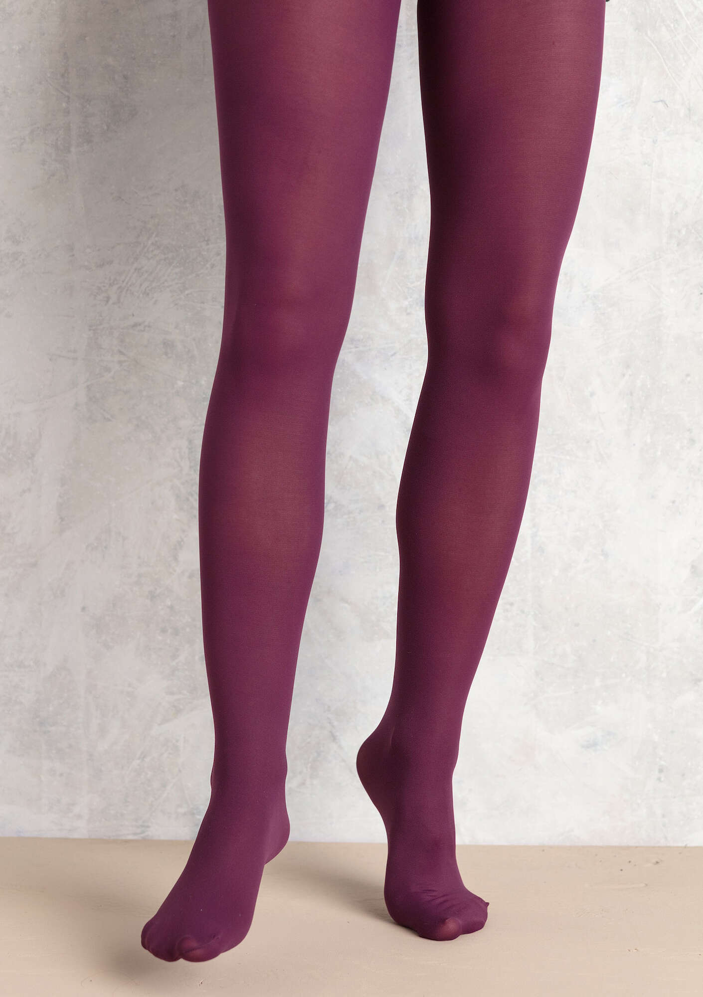 Solid-colored tights in recycled nylon allium