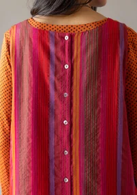 “Ketchi” woven jumper dress in wool/cotton - pomegranate