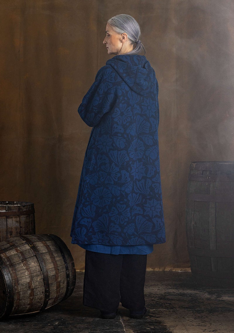 “Wind” knitted coat crafted from felted organic wool dark indigo