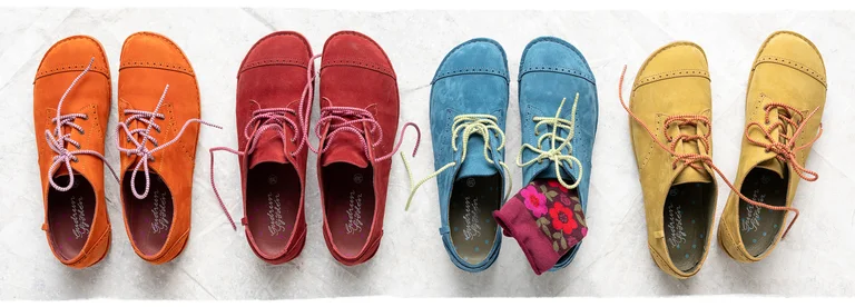 Four pairs of lace-up shoes in different colours from Gudrun Sjödén.
