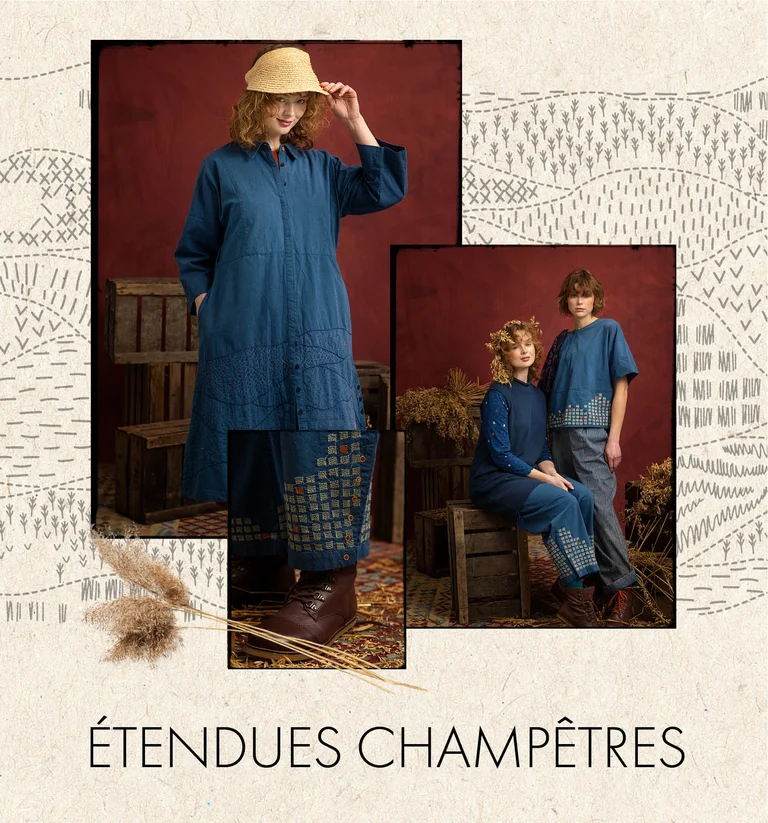 Une femme portant une robe brodée en tissu bleu indigo signée Gudrun Sjödén.