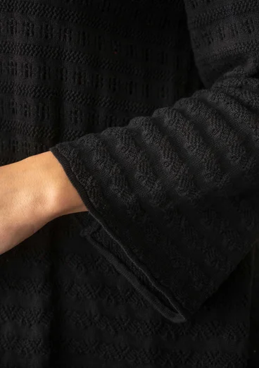 Pointellestrikket jakke «Heiwa» i økologisk / resirkulert bomull - svart