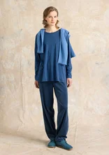 Solid-colored velour pants in organic cotton/recycled polyester - Pacific blue